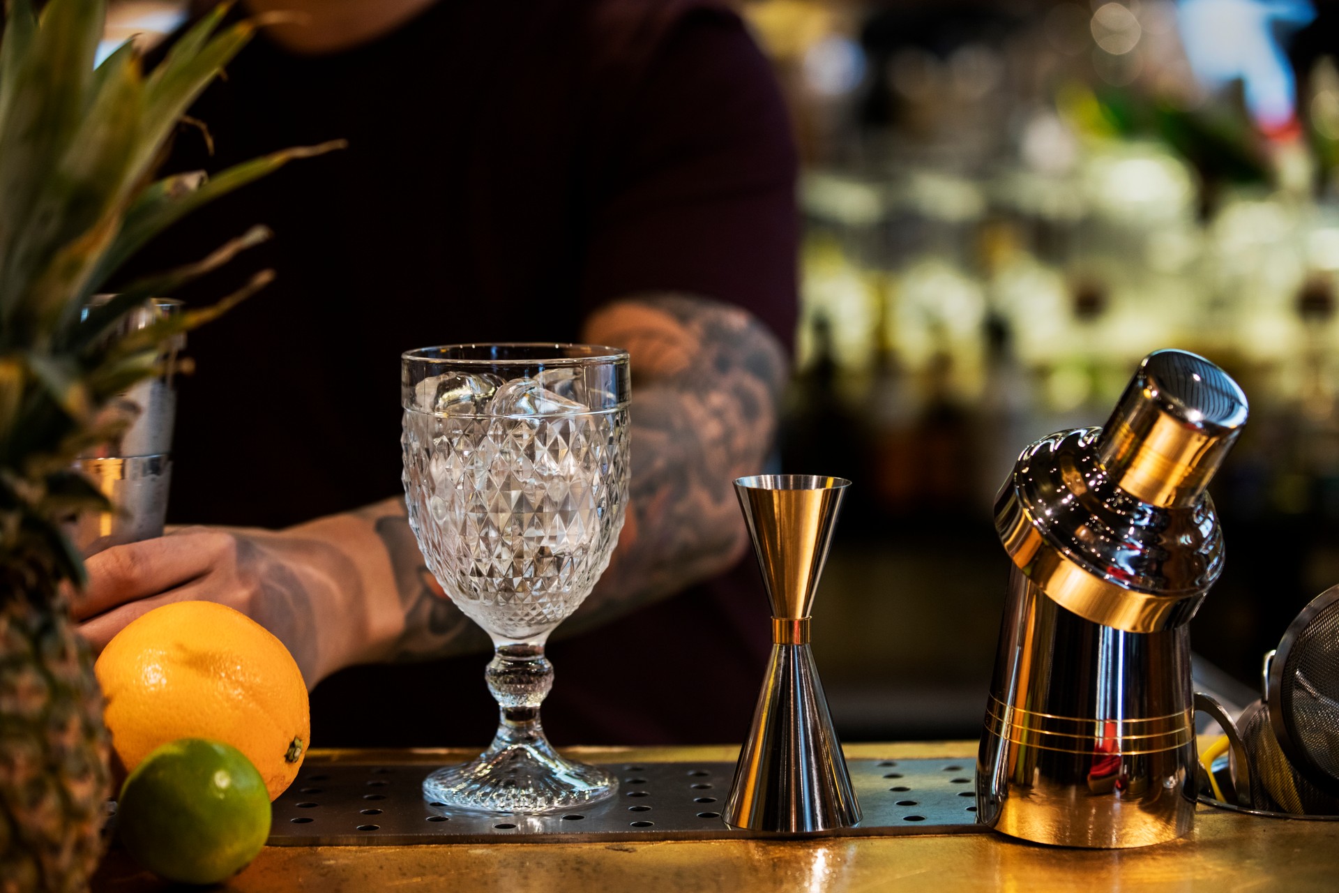 Cocktail shaker and jigger of Japanese style with vintage glass